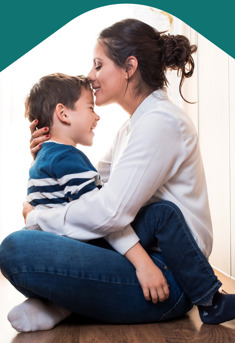 Photo: Mother hugging child