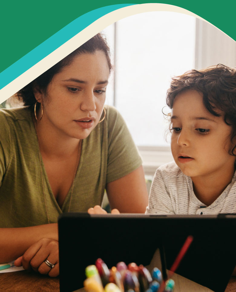 Photo: Mother and child looking at a tablet
