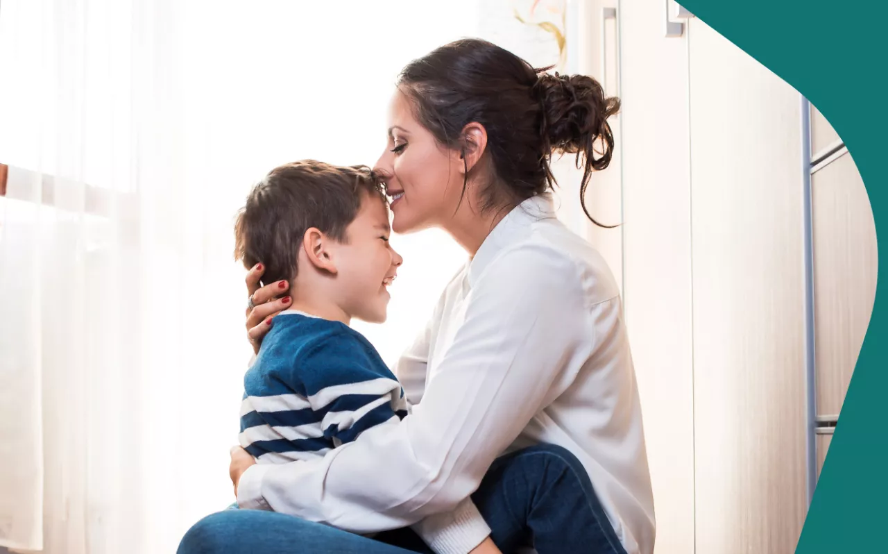 Photo: Mother hugging child