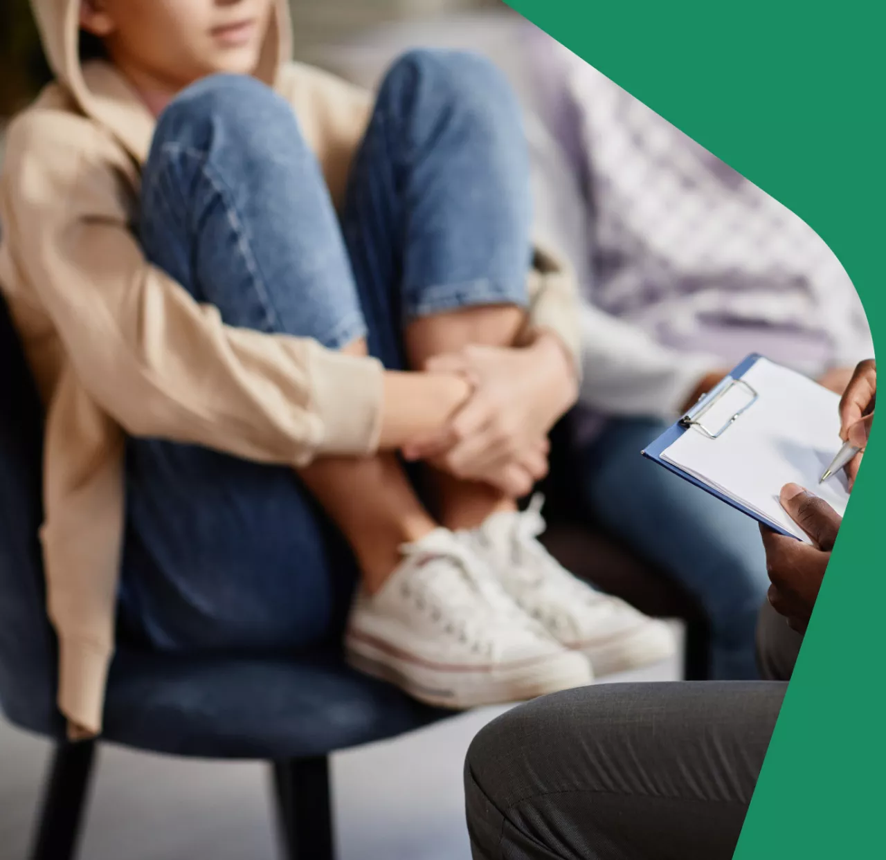 Photo: Therapist talking to family