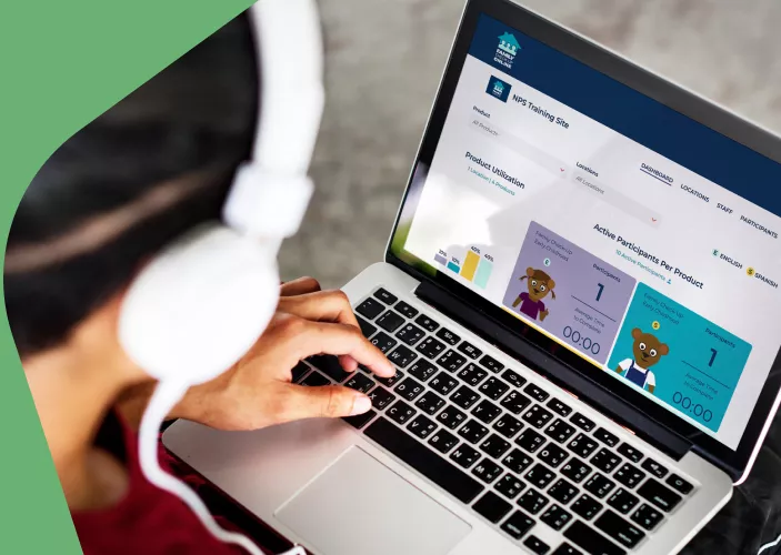 Photo: Parent using a laptop computer